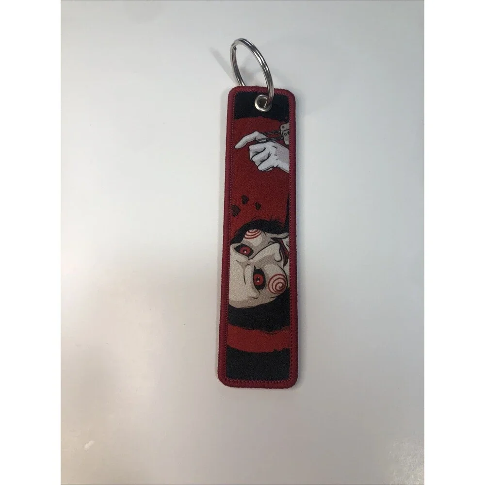 embroidered Jigsaw/Billy the Puppet key tag or keychain from the Saw  movie